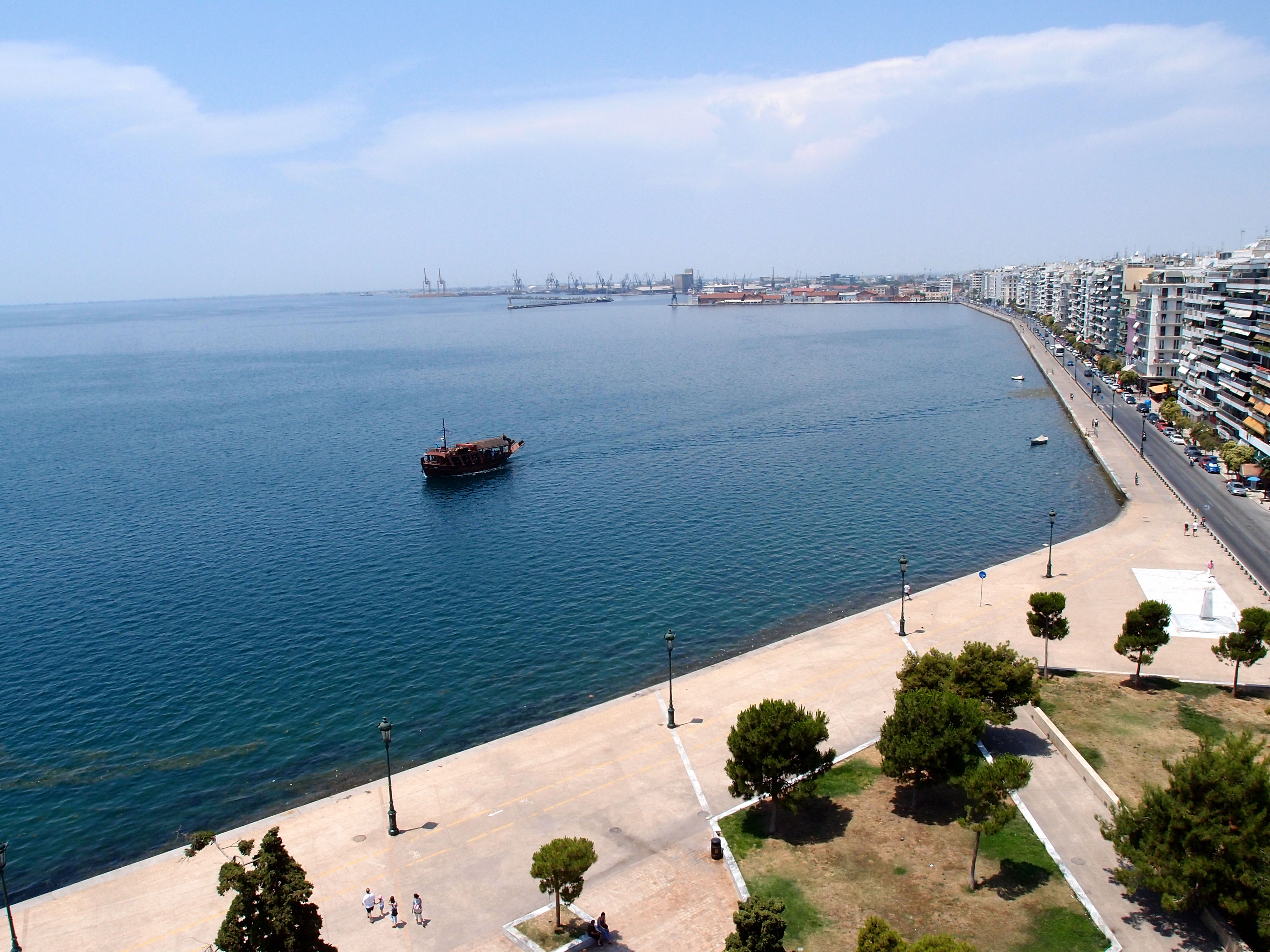 
Aerial view of Thessaloniki waterfront promenade and sailing boat on the bay, Greece